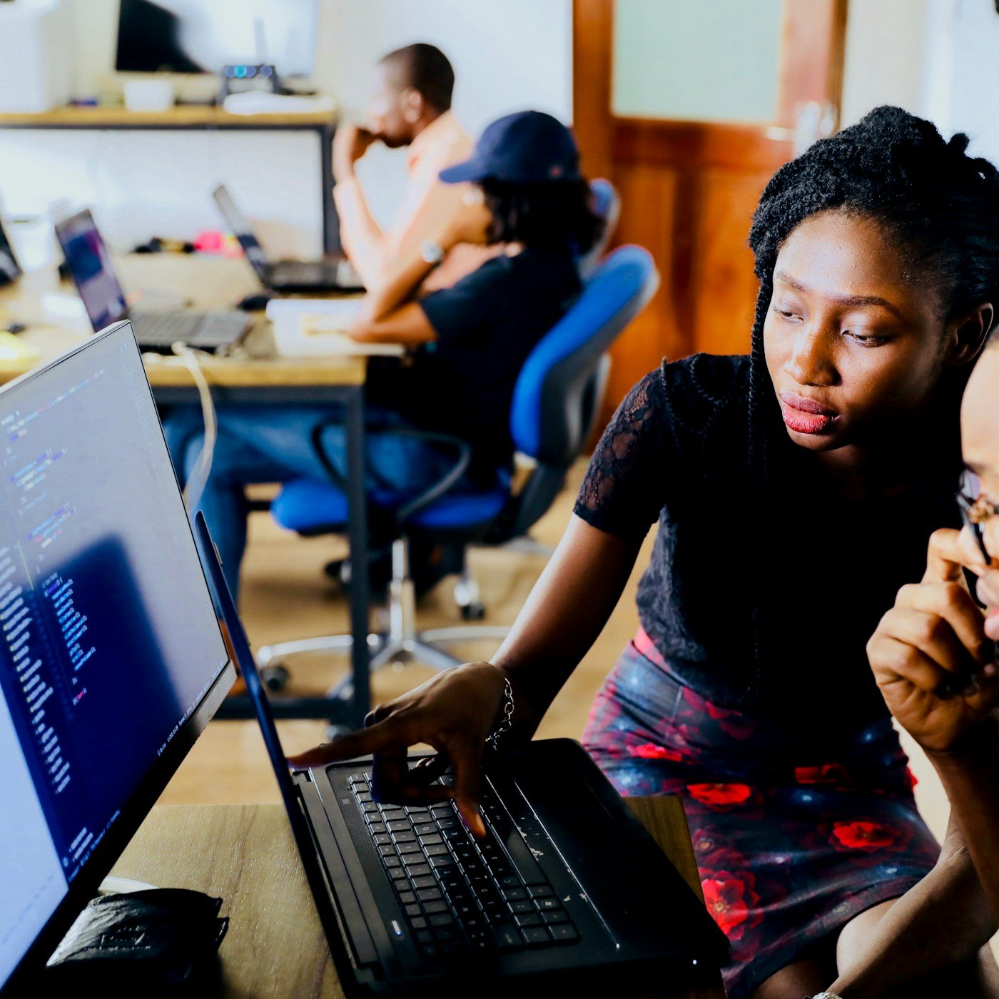 Microsoft Power Apps team in a modern office